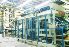 國內最先進的免燒砌塊磚機